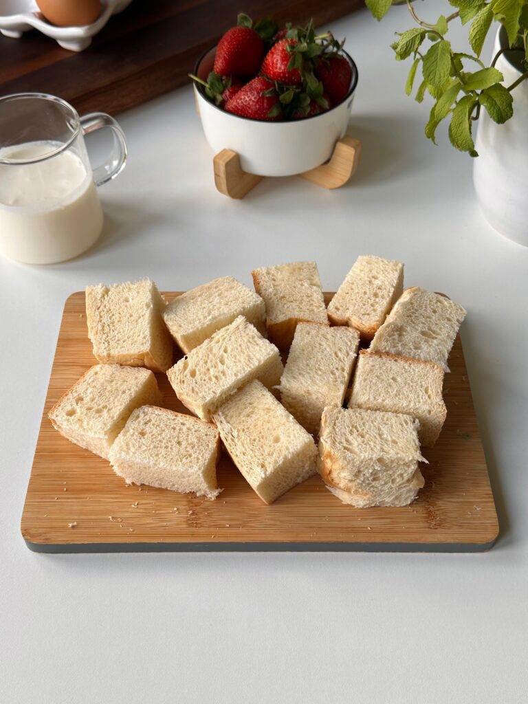 Brioche bread cut into small even squares for French toast bites.