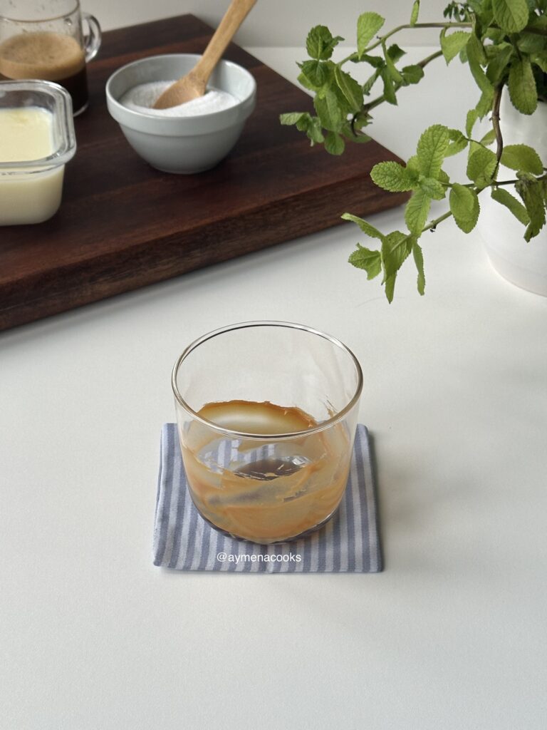caramel sauce drizzled inside a glass for creme brulee latte