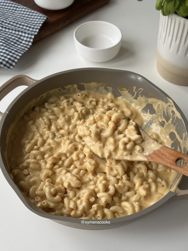 Creamy stovetop macaroni and cheese in the pan.