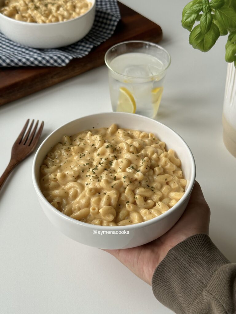 Finished stovetop mac and cheese served warm in a bowl.