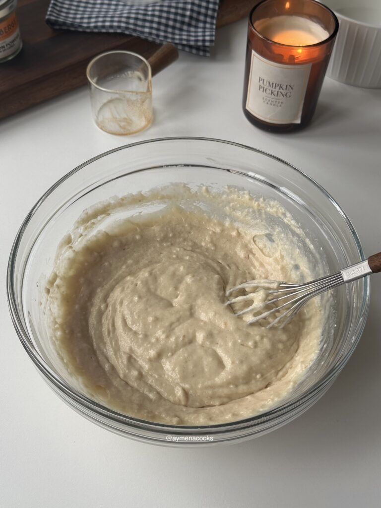 Thick cinnamon roll pancake batter with some lumps.