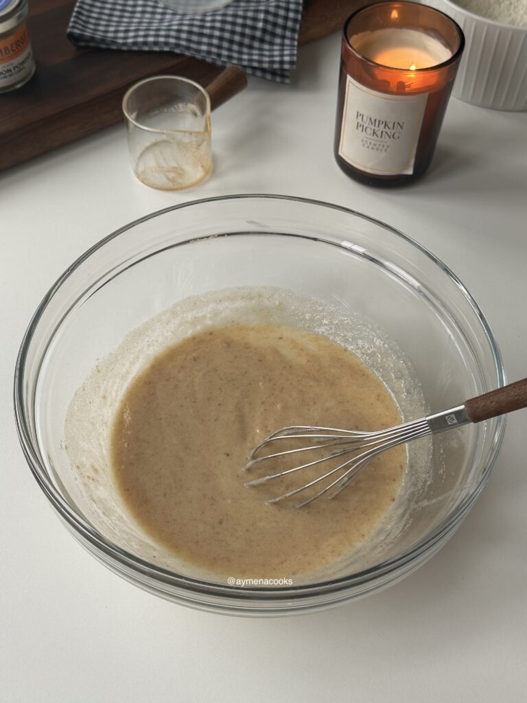 Egg, milk, yogurt, oil, vanilla and browned butter whisked for pancake batter.