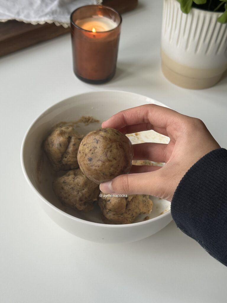 Chilled espresso cookie dough rolled into equal-sized balls.